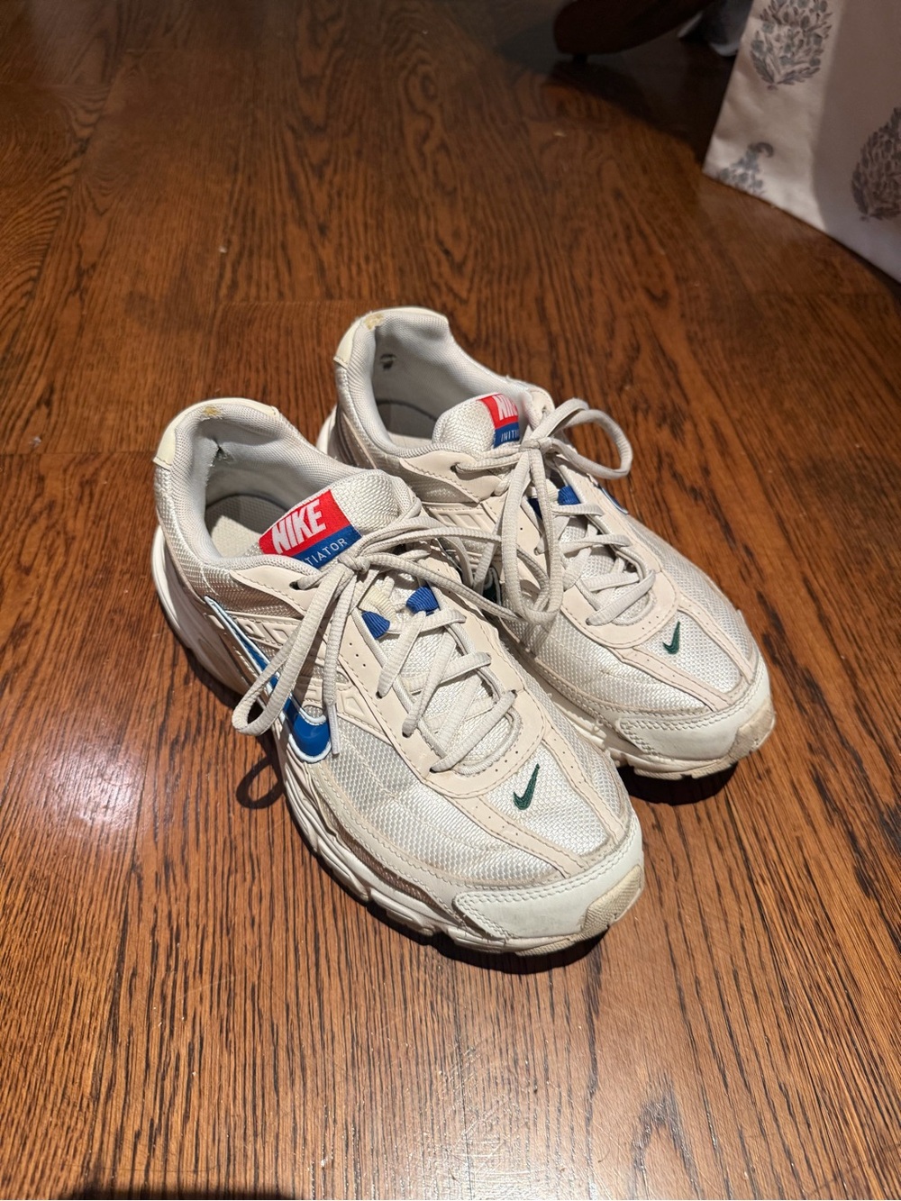 Nike Off-White/Tan Sneakers with Blue & Green Accents